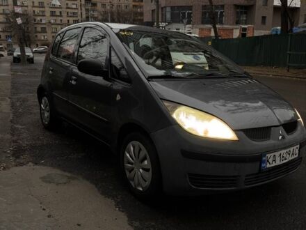 Серый Мицубиси Кольт, объемом двигателя 1.3 л и пробегом 261 тыс. км за 3500 $, фото 1 на Automoto.ua