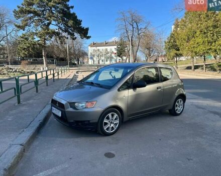 Серый Мицубиси Кольт, объемом двигателя 1.33 л и пробегом 205 тыс. км за 4400 $, фото 1 на Automoto.ua