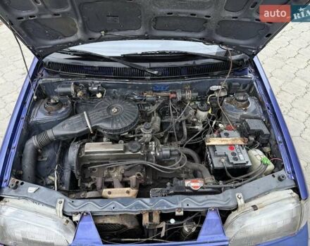 Синій Міцубісі Кольт, об'ємом двигуна 1 л та пробігом 166 тис. км за 1700 $, фото 16 на Automoto.ua