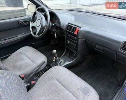 Синій Міцубісі Кольт, об'ємом двигуна 1 л та пробігом 166 тис. км за 1700 $, фото 10 на Automoto.ua