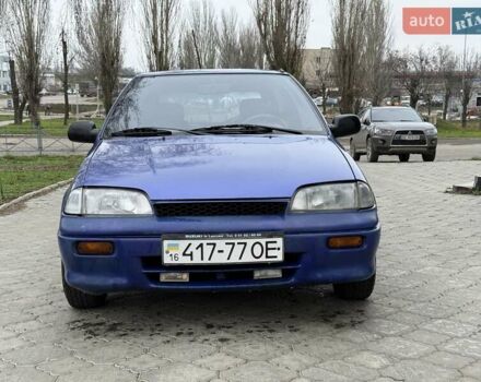 Синій Міцубісі Кольт, об'ємом двигуна 1 л та пробігом 166 тис. км за 1700 $, фото 1 на Automoto.ua