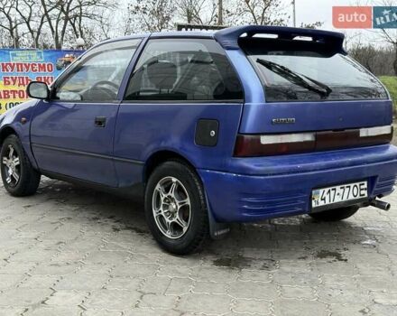 Синій Міцубісі Кольт, об'ємом двигуна 1 л та пробігом 166 тис. км за 1700 $, фото 5 на Automoto.ua