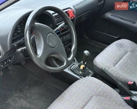 Синій Міцубісі Кольт, об'ємом двигуна 1 л та пробігом 166 тис. км за 1700 $, фото 7 на Automoto.ua