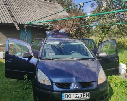 Синій Міцубісі Кольт, об'ємом двигуна 1.33 л та пробігом 250 тис. км за 3400 $, фото 12 на Automoto.ua