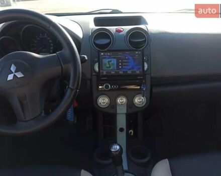 Синий Мицубиси Кольт, объемом двигателя 1.12 л и пробегом 205 тыс. км за 3600 $, фото 7 на Automoto.ua
