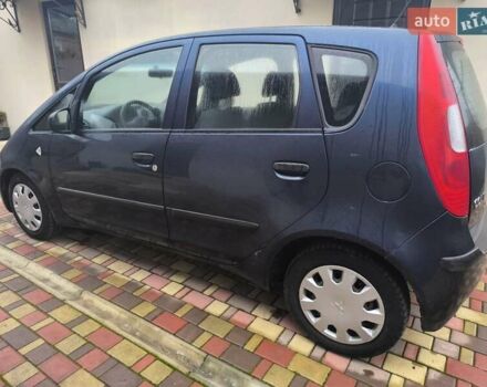 Синій Міцубісі Кольт, об'ємом двигуна 1.12 л та пробігом 106 тис. км за 3450 $, фото 9 на Automoto.ua