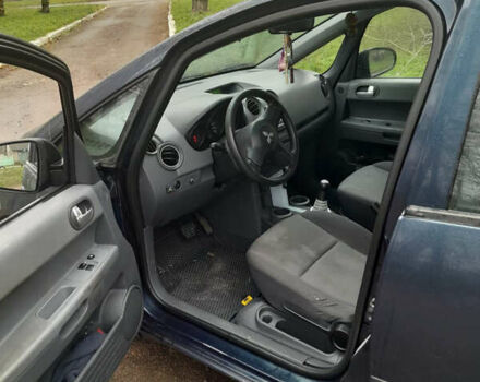 Синій Міцубісі Кольт, об'ємом двигуна 1.33 л та пробігом 214 тис. км за 4800 $, фото 9 на Automoto.ua