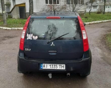 Синій Міцубісі Кольт, об'ємом двигуна 1.3 л та пробігом 214 тис. км за 4900 $, фото 1 на Automoto.ua