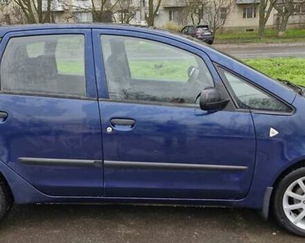 Синий Мицубиси Кольт, объемом двигателя 1.33 л и пробегом 146 тыс. км за 4500 $, фото 1 на Automoto.ua