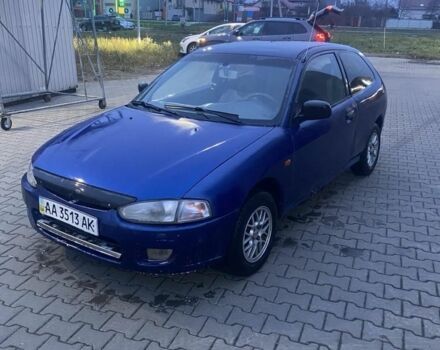 Синий Мицубиси Кольт, объемом двигателя 1.3 л и пробегом 330 тыс. км за 1000 $, фото 1 на Automoto.ua