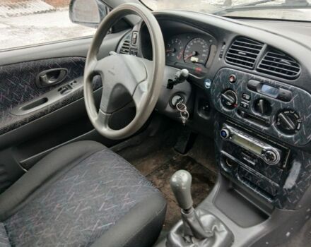 Зеленый Мицубиси Кольт, объемом двигателя 1.5 л и пробегом 234 тыс. км за 1017 $, фото 4 на Automoto.ua