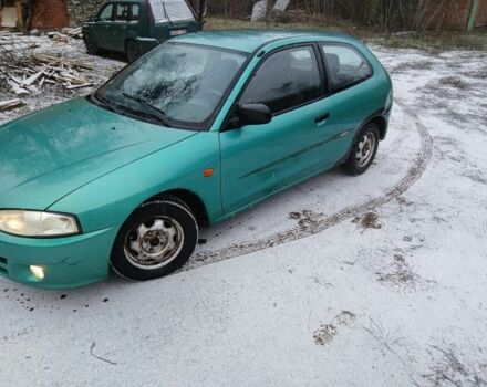 Зеленый Мицубиси Кольт, объемом двигателя 1.5 л и пробегом 234 тыс. км за 1017 $, фото 1 на Automoto.ua