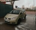 Зеленый Мицубиси Кольт, объемом двигателя 1.3 л и пробегом 273 тыс. км за 2054 $, фото 1 на Automoto.ua