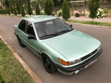 Мицубиси Кольт 1990 в Киеве на Automoto.ua Зеленый Мицубиси Кольт, объемом двигателя 1.5 л и пробегом 312 тыс. км за 800 $, фото 1 на Automoto.ua