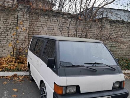 Белый Мицубиси Делика, объемом двигателя 2 л и пробегом 5 тыс. км за 850 $, фото 1 на Automoto.ua