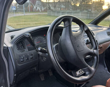 Черный Мицубиси Делика, объемом двигателя 3 л и пробегом 184 тыс. км за 18700 $, фото 18 на Automoto.ua