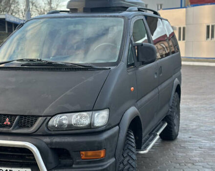 Черный Мицубиси Делика, объемом двигателя 3 л и пробегом 184 тыс. км за 18700 $, фото 12 на Automoto.ua