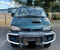 Красный Мицубиси Делика, объемом двигателя 2.8 л и пробегом 135 тыс. км за 6450 $, фото 1 на Automoto.ua
