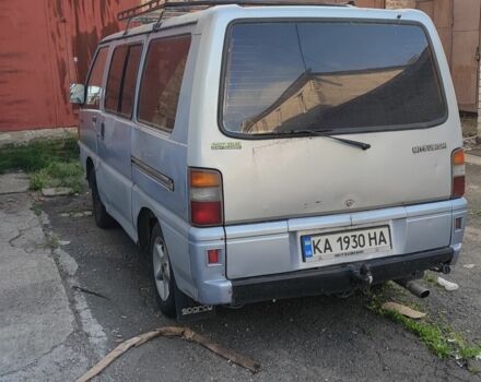 Серый Мицубиси Делика, объемом двигателя 2 л и пробегом 242 тыс. км за 1491 $, фото 1 на Automoto.ua