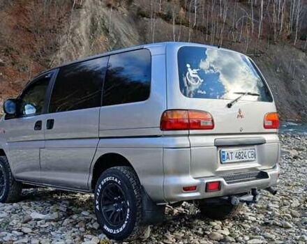 Серый Мицубиси Делика, объемом двигателя 2.5 л и пробегом 347 тыс. км за 9000 $, фото 2 на Automoto.ua