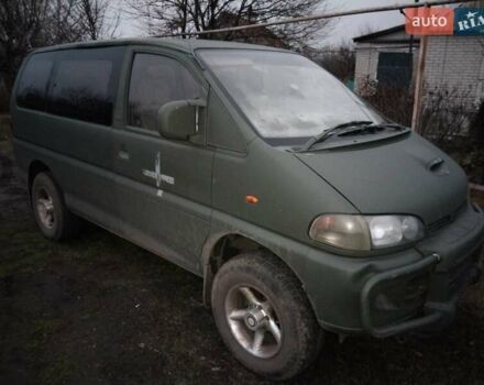 Серый Мицубиси Делика, объемом двигателя 2.8 л и пробегом 175 тыс. км за 5000 $, фото 1 на Automoto.ua