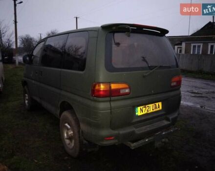 Серый Мицубиси Делика, объемом двигателя 2.8 л и пробегом 175 тыс. км за 5000 $, фото 1 на Automoto.ua