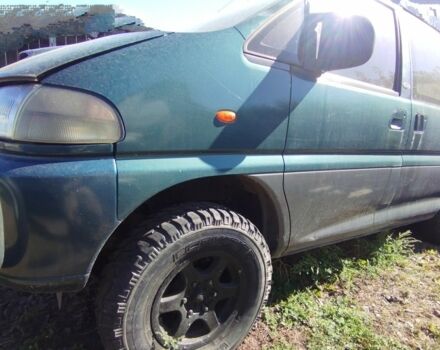 Зеленый Мицубиси Делика, объемом двигателя 0 л и пробегом 300 тыс. км за 8000 $, фото 2 на Automoto.ua