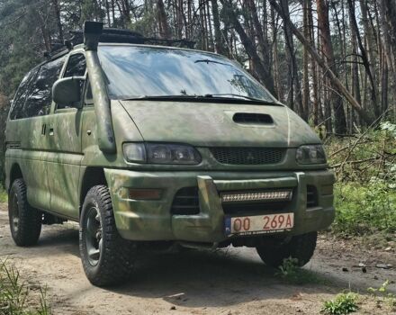 Зелений Міцубісі Деліка, об'ємом двигуна 2.5 л та пробігом 315 тис. км за 3700 $, фото 1 на Automoto.ua