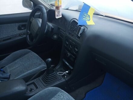 Сірий Міцубісі Інша, об'ємом двигуна 2 л та пробігом 340 тис. км за 1800 $, фото 1 на Automoto.ua