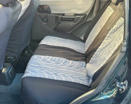 Зелений Міцубісі Інша, об'ємом двигуна 1.8 л та пробігом 161 тис. км за 5490 $, фото 17 на Automoto.ua