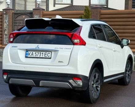 Белый Мицубиси Эклипс, объемом двигателя 1.5 л и пробегом 67 тыс. км за 14400 $, фото 11 на Automoto.ua