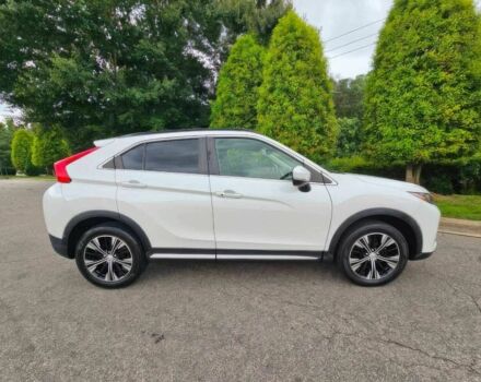 Белый Мицубиси Эклипс, объемом двигателя 1.5 л и пробегом 45 тыс. км за 11200 $, фото 7 на Automoto.ua