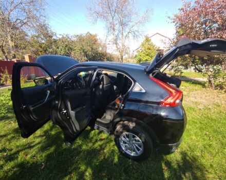 Черный Мицубиси Эклипс, объемом двигателя 1.5 л и пробегом 9 тыс. км за 16300 $, фото 4 на Automoto.ua