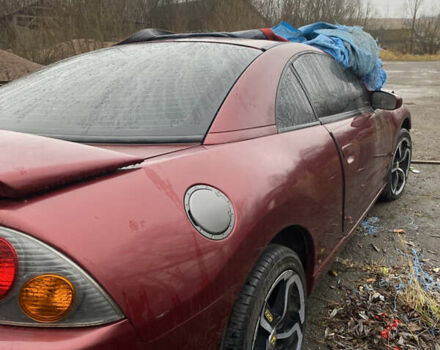 Красный Мицубиси Эклипс, объемом двигателя 2.4 л и пробегом 200 тыс. км за 3000 $, фото 1 на Automoto.ua