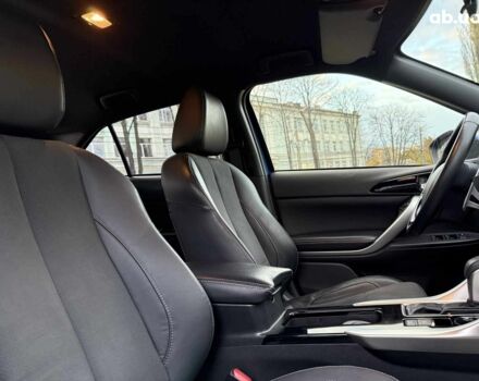 Синій Міцубісі Екліпс, об'ємом двигуна 2 л та пробігом 85 тис. км за 22990 $, фото 29 на Automoto.ua