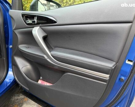 Синій Міцубісі Екліпс, об'ємом двигуна 2 л та пробігом 85 тис. км за 22990 $, фото 27 на Automoto.ua