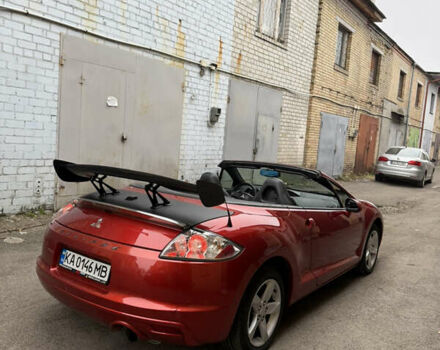 Оранжевый Мицубиси Эклипс, объемом двигателя 2.38 л и пробегом 97 тыс. км за 7500 $, фото 4 на Automoto.ua