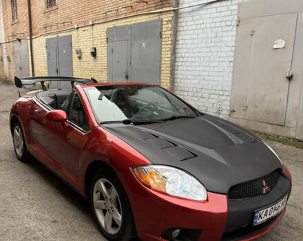Оранжевый Мицубиси Эклипс, объемом двигателя 2.38 л и пробегом 97 тыс. км за 7500 $, фото 5 на Automoto.ua