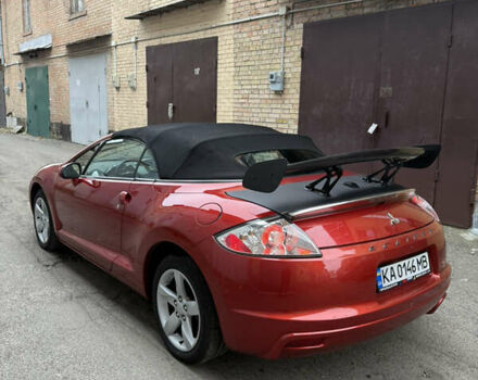 Оранжевый Мицубиси Эклипс, объемом двигателя 2.38 л и пробегом 97 тыс. км за 7500 $, фото 2 на Automoto.ua