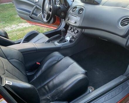 Оранжевый Мицубиси Эклипс, объемом двигателя 2.4 л и пробегом 120 тыс. км за 6500 $, фото 14 на Automoto.ua