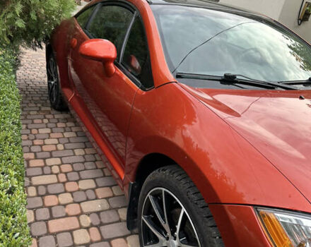 Оранжевый Мицубиси Эклипс, объемом двигателя 2.38 л и пробегом 290 тыс. км за 7600 $, фото 6 на Automoto.ua