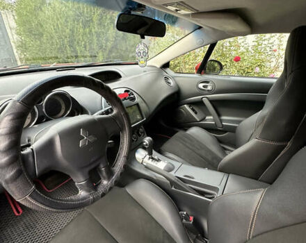 Оранжевый Мицубиси Эклипс, объемом двигателя 2.38 л и пробегом 290 тыс. км за 7600 $, фото 13 на Automoto.ua