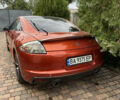 Оранжевый Мицубиси Эклипс, объемом двигателя 2.38 л и пробегом 290 тыс. км за 7600 $, фото 5 на Automoto.ua