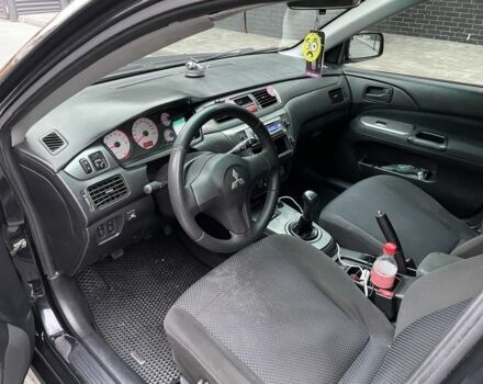 Черный Мицубиси Этерна, объемом двигателя 1.6 л и пробегом 302 тыс. км за 3900 $, фото 7 на Automoto.ua