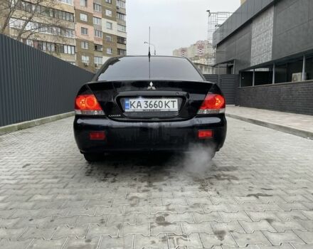 Черный Мицубиси Этерна, объемом двигателя 1.6 л и пробегом 302 тыс. км за 3900 $, фото 4 на Automoto.ua