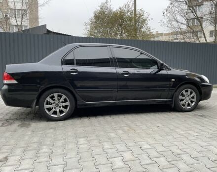 Черный Мицубиси Этерна, объемом двигателя 1.6 л и пробегом 302 тыс. км за 3900 $, фото 5 на Automoto.ua