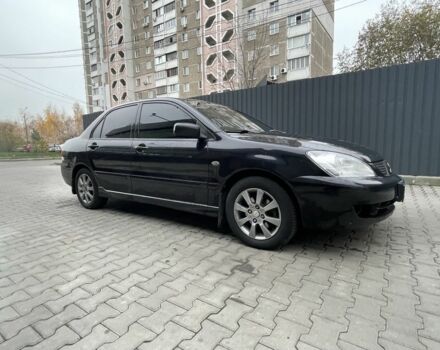 Черный Мицубиси Этерна, объемом двигателя 1.6 л и пробегом 302 тыс. км за 3900 $, фото 1 на Automoto.ua
