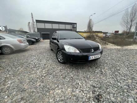 Черный Мицубиси Этерна, объемом двигателя 1.6 л и пробегом 302 тыс. км за 3900 $, фото 1 на Automoto.ua