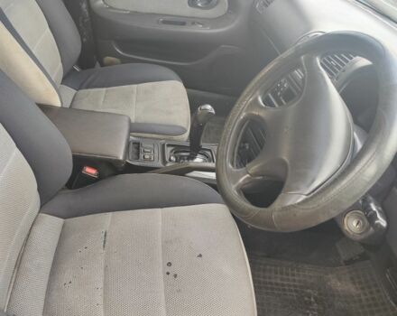 Серый Мицубиси Этерна, объемом двигателя 2 л и пробегом 172 тыс. км за 800 $, фото 2 на Automoto.ua