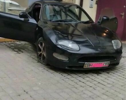 Черный Мицубиси ФТО, объемом двигателя 2 л и пробегом 680 тыс. км за 7500 $, фото 2 на Automoto.ua